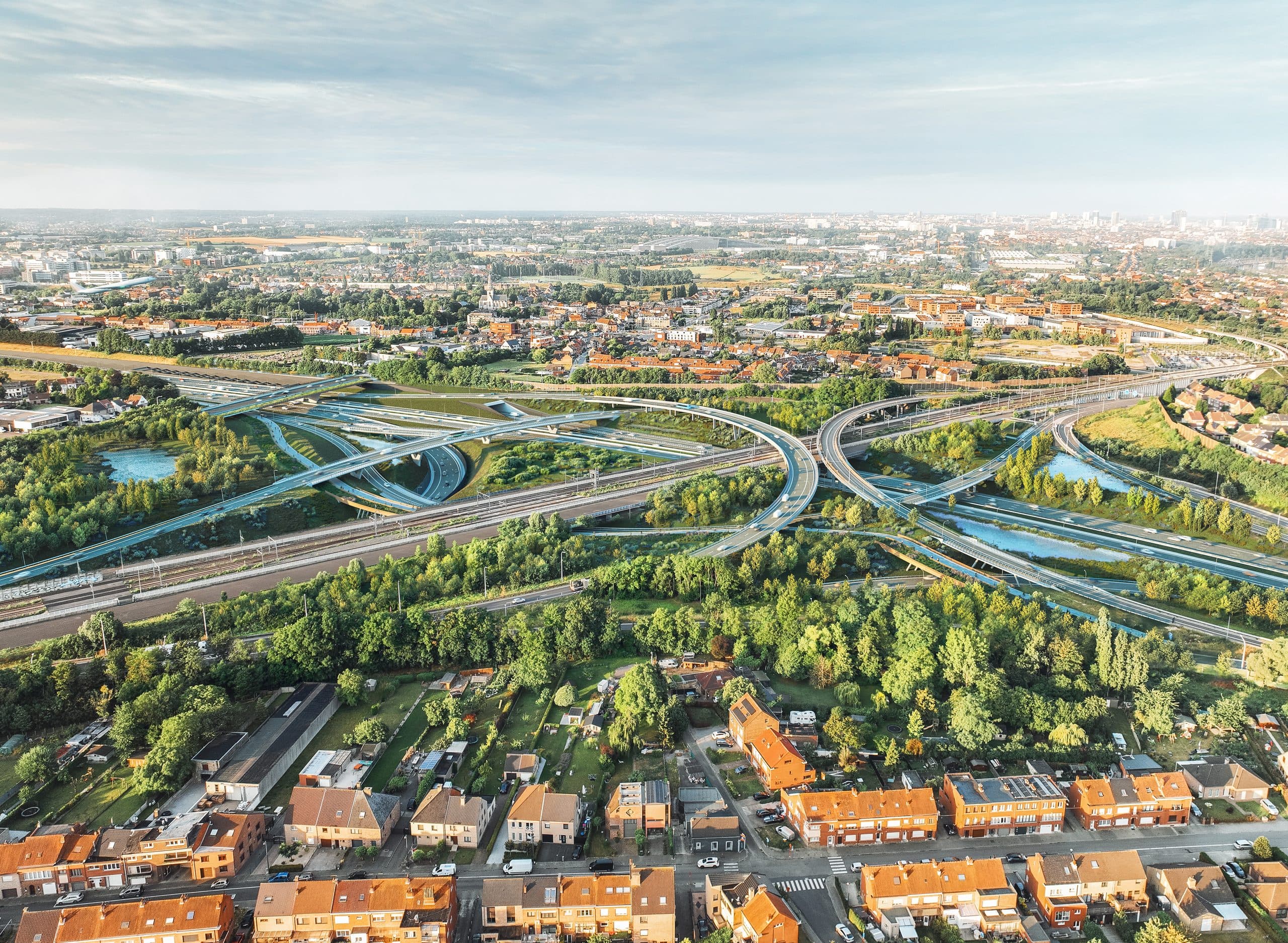 Dronebeeld van de herontworpen Brusselse Ring aan de rand van de woonwijk, compact ingepast tussen bebouwing en groen