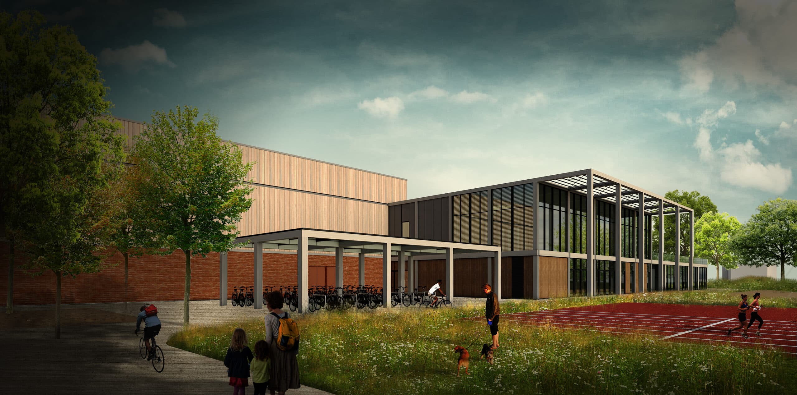 Avondrender van het balsportcomplex in Willebroek: metselwerkbasis met houten bovenbouw, overdekte fietsenstalling onder een pergola en de atletiekbaan in het activiteitenpark